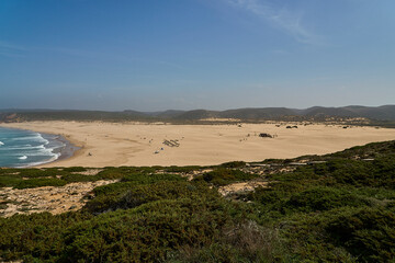 rugged cliffs and sand beaches at Praia Do Bordeira Beach.