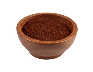 Ground coffee in a wooden cup