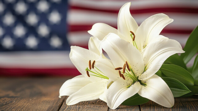 Beautiful white lilies arranged in front of American flag, symbolizing patriotism and nature elegance
