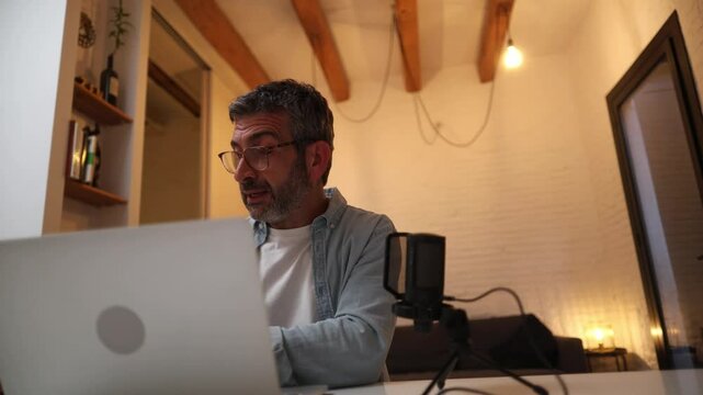 Professor recording online course from home
