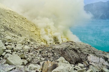 Sulphur plumes rise from the Yijen Volcano, revealing the unique geology of Indonesia's sulphur mines during a clear day