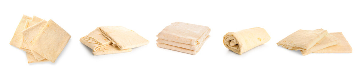 Set of fresh thin lavash on white background