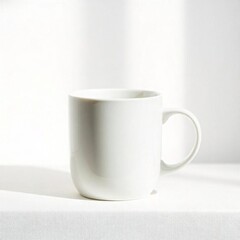 Obraz premium A plain white ceramic mug with a simple, minimalist design, white background