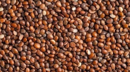 Fototapeta premium Boiled adzuki beans texture close-up showcasing their rich brown colors and natural patterns suitable for culinary and health-related projects.