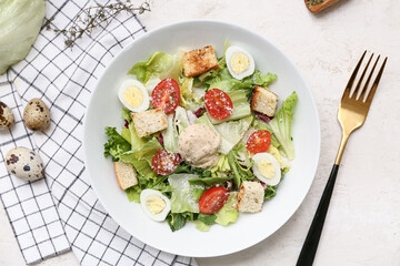 Bowl with tasty chicken Caesar salad on white background