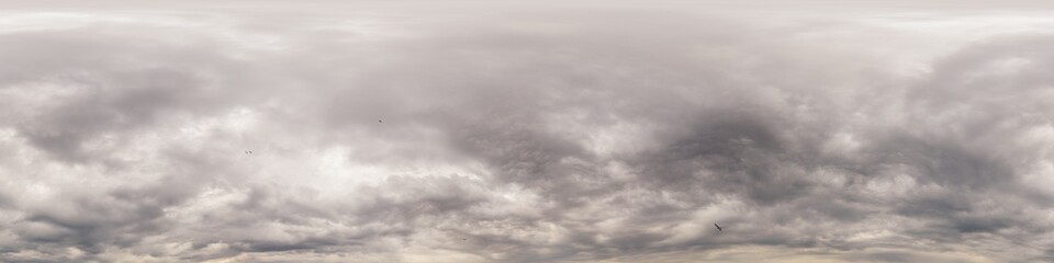 Dramatic Sunset sky 360 panorama. Vibrant sky with bright glowing red pink Cumulus clouds. HDR 360...