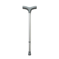 Action of using a walking cane in rehabilitation therapy session hospital room medical equipment clinical environment close-up view mobility assistance concept