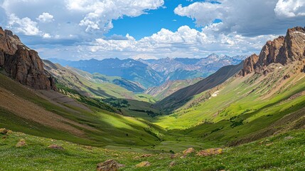 Fototapeta premium Majestic Mountain Valley Landscape Under a Cloudy Sky