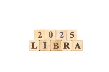 Libra zodiac sign word in wooden cubes. White background. Set of astrology symbols. Horoscope 2025 September 22 October 23.