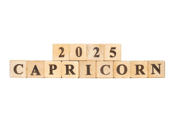 Capricorn zodiac sign word in wooden cubes. White background. Set of astrology symbols. Horoscope 2025 December 22 January 19.