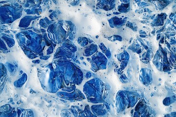 Obraz premium Abstract blue and white foam texture.
