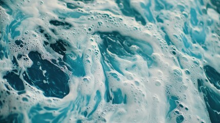 Obraz premium A close-up view of a single turquoise wave curling dramatically, with white foam glistening in the sunlight.