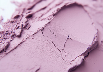 Purple Clay cosmetic texture on the background, close-up. Background of smudged cream for face or body mask. Close-up of a pink creamy swatch.