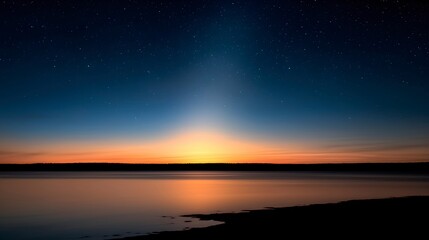 Fototapeta premium Serene Sunrise Over Calm Waters and Starry Sky