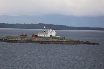 Flatflesa Lighthouse is a light station in the Lyngværfjord, Aukra, Møre and Romsdal...