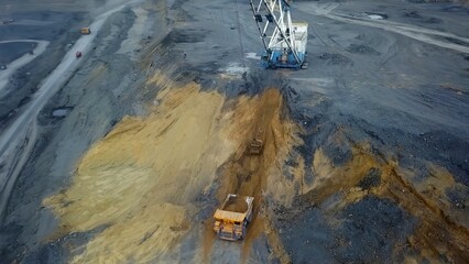 Heavy Machinery is engaged in Digging Operations at the Construction Site, including excavation....