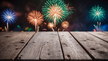 A tight shot of a rustic, unoccupied wooden table, featuring blurred fireworks in the backdrop.