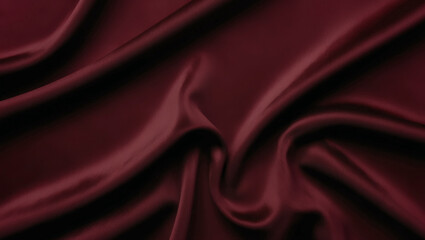 Obraz premium Deep burgundy matte fabric texture with flowing folds and soft gradients. Perfect as a stylish and sophisticated background for graphic design, photography, or branding