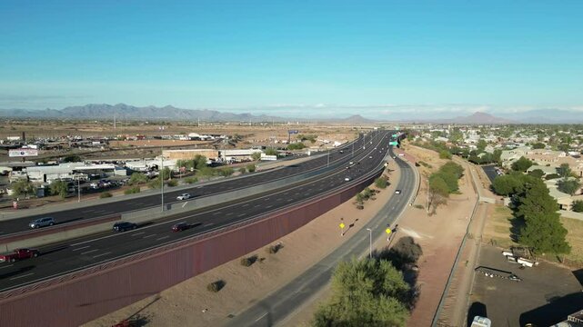Aerial view of Mesa, Arizona Freeway Red Mountain 202 at Country Club. light traffic on a sunny day