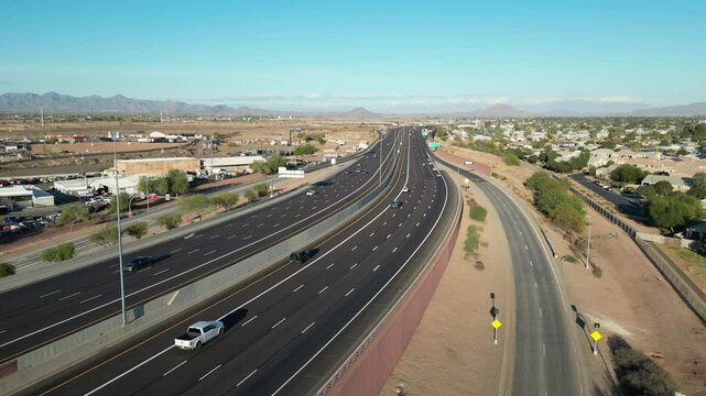Aerial view of Mesa, Arizona Freeway Red Mountain 202 at Country Club. light traffic on a sunny day