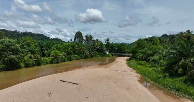 Aerial drone shot on Plai Wha River at Phang Nga, Surat Thani, Thailand with nature forest trees