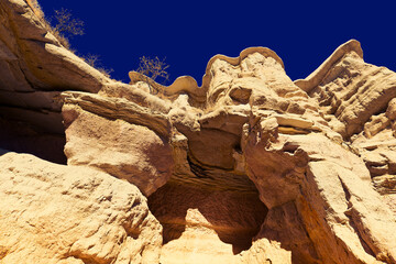 Picturesque extraordinary naturally formed, towering rock formations with the unique shapes - the edge of rocky cliff. Central Anatolia, Cappadocia, Nevsehir, Turkey 