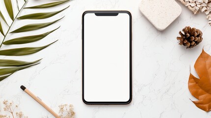 A blank smartphone screen resting on a patterned surface with natural and creative elements