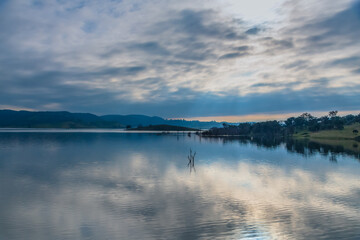 Morning cloud reflections at Windamere Dam in Cudgegong, close to Mudgee in the Central West of NSW, Australia.