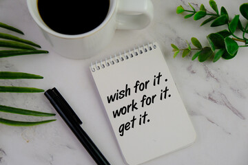 Motivational quote - wish for it, work for it, get it. Note to self concept with text on a notebook with pen and a clock. Self confidence motivation and reminder. Believe in yourself. 