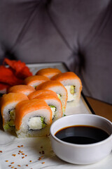 Philadelphia rolls with sauce and red ginger