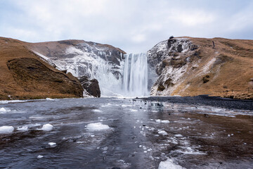 Panoramic view of Skogafoss waterfall in winter in South Iceland