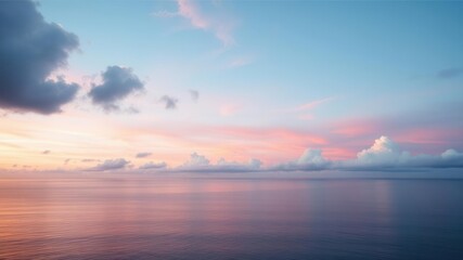 Fototapeta premium Serene Ocean at Dawn with Gentle Waves Reflecting the Colorful Sky and Soft Clouds in Tranquil Harmony for a Peaceful Atmosphere
