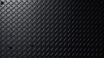 Textured Black Metal Surface with Diamond Pattern Ideal for Backgrounds, Industrial Themes, and Graphic Design Projects Featuring a Modern Aesthetic