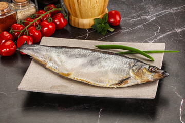 Whole raw salted herring fish