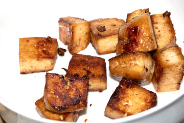 Roasted Cooked Tofu Soya On a White Bowl