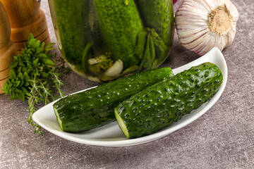 Homemade lighty salted cucumbers with herbs