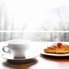cup of coffee and croissant