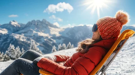 Gordijnen Woman relaxes in snowy mountains enjoying winter sunshine © ABIDZAR ALFAREZ