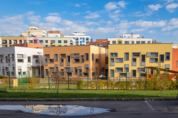 Modern apartment building with colorful facades on the outskirts of the city. Residential Complex 'In the forest', Moscow, Russia