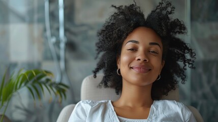 Portrait of beautiful african american woman with afro hairstyle at home