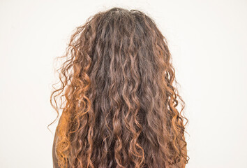 woman with long curly blonde hair