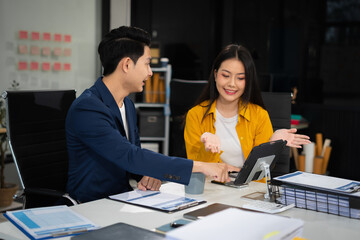 Asian business people discussing on performance revenue in meeting. businessman working with co-worker team. financial adviser analysing data with investor.
