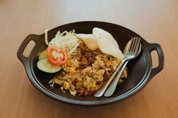A plate of Indonesian nasi goreng or fried rice
