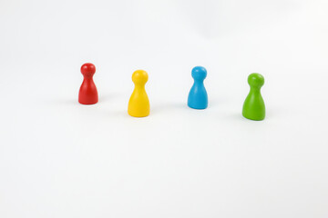 Colorful game pawns isolated on a white background. Diversity and teamwork concept for business presentations and HR campaigns