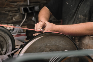 Craftsman working with tool in carpentry workshop