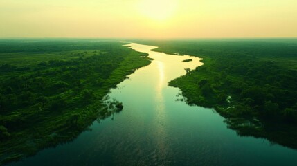 Fototapeta premium Serene River Flows Through Lush Green Landscape At Sunset
