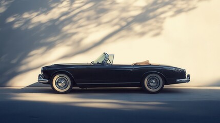 Fototapeta premium Vintage Minimalistic Convertible Car Parked Against a Soft Sunlit Wall with Subtle Shadows and Classic Elegance