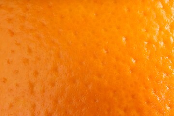 Fresh orange peel as background, macro view