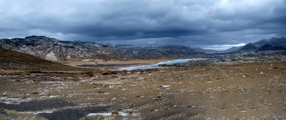 Panoramic view of snow capped mountain landscapes with blue sky background