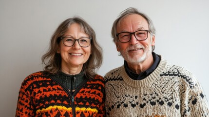 Happy Senior Couple Smiling Together Wearing Sweaters